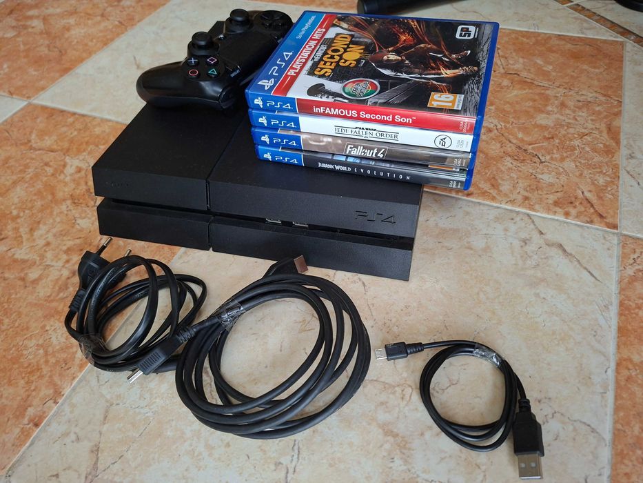 Playstation 4 500Gb com 1 comando e 4 jogos