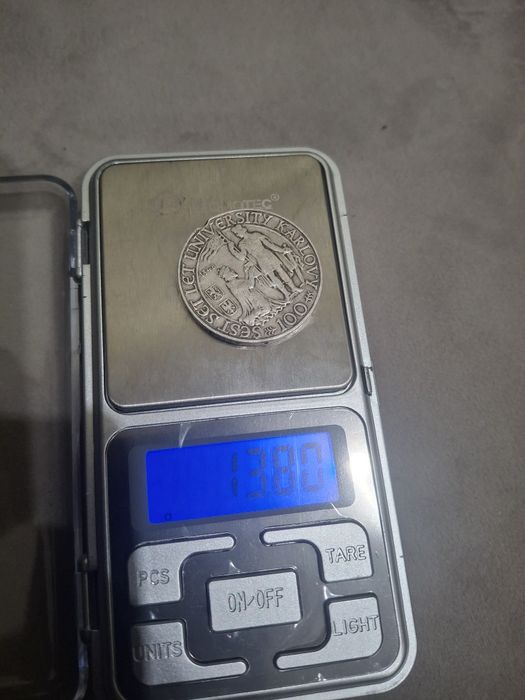 Срібна монета 100 крон