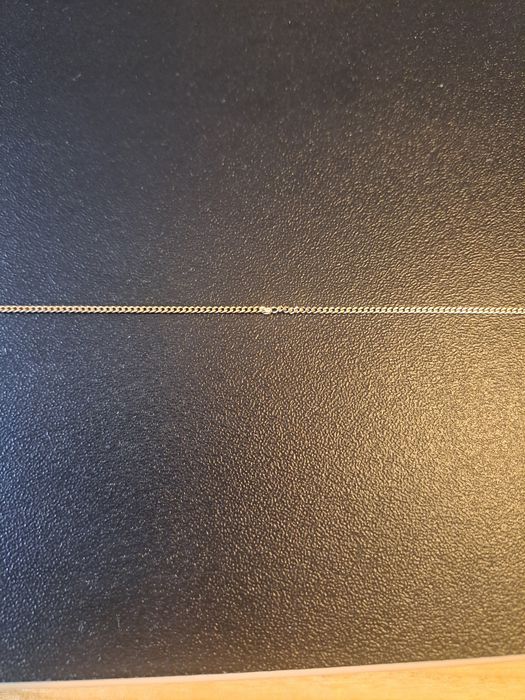 Złoty łańcuszek z krzyżykiem 585 56,5cm 3,54g 330zł/g