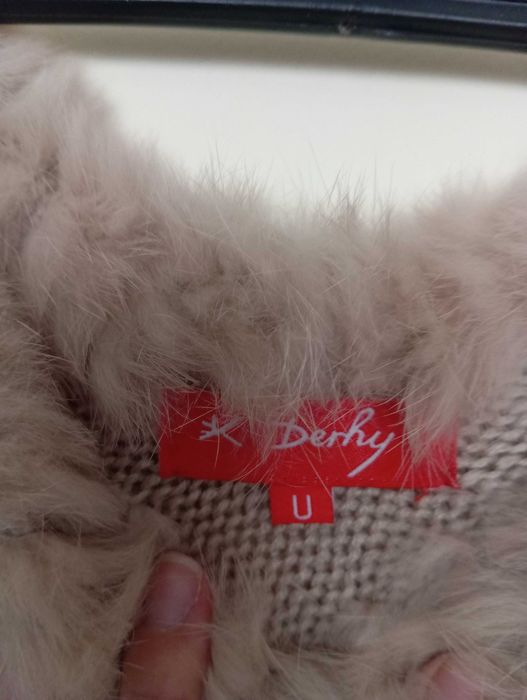 Poncho de pelo de coelho