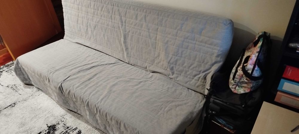 Sofá cama com capa