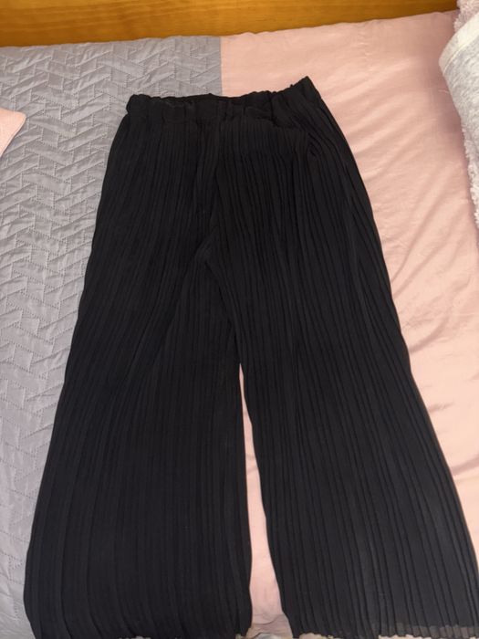 Calcas pretas larguinhas tipo balao