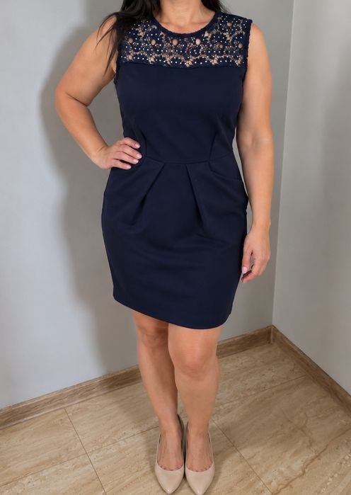 Elegancka sukienka z kieszeniami