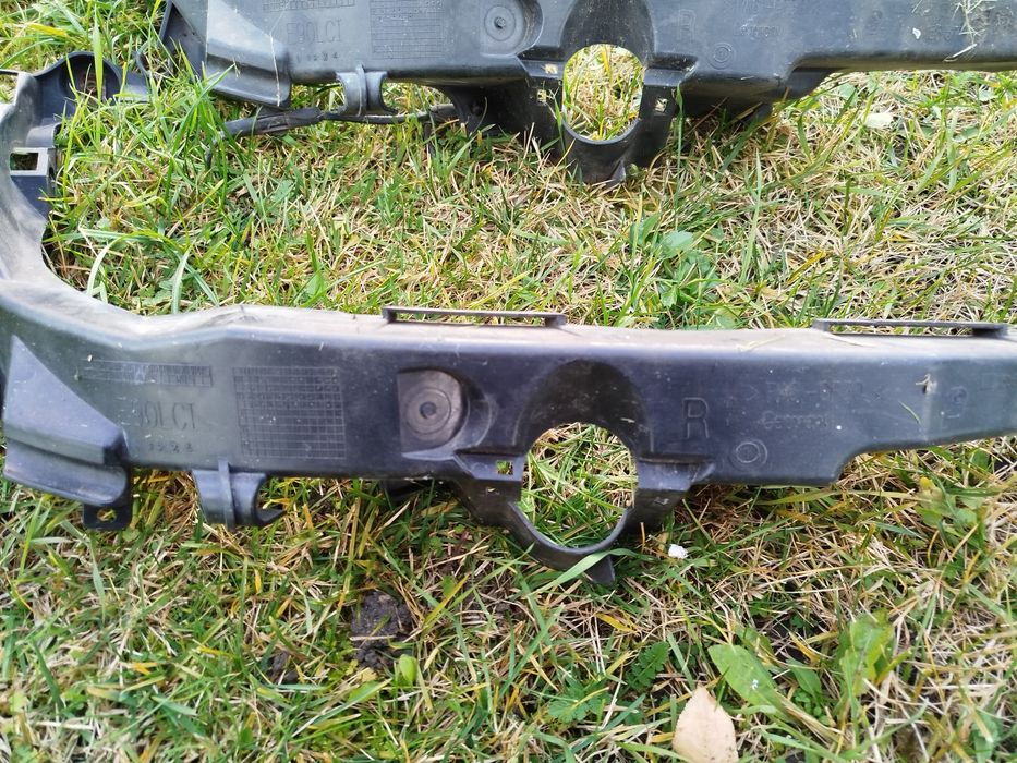 Slizg mocowanie lampy przód BMW E90 E91 lift prawy
