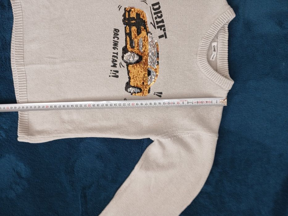 Sweter z cekinami