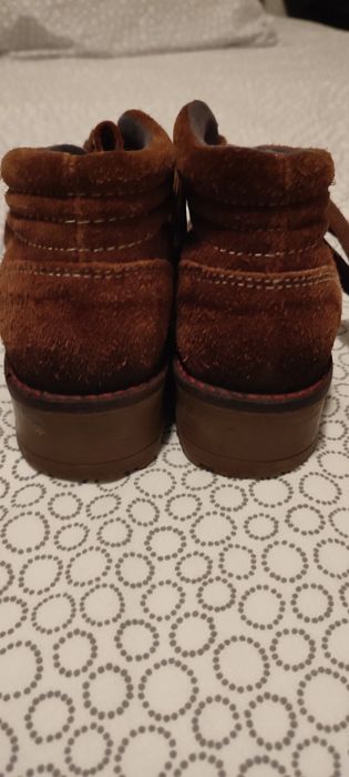 Botas de pele castanhas