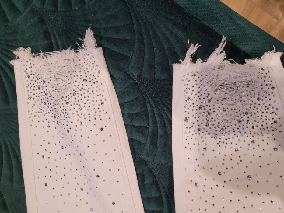 Spodnie damskie białe nowe L