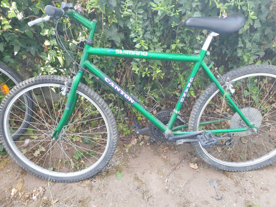 Bicicleta de homem em estado aceitavel.