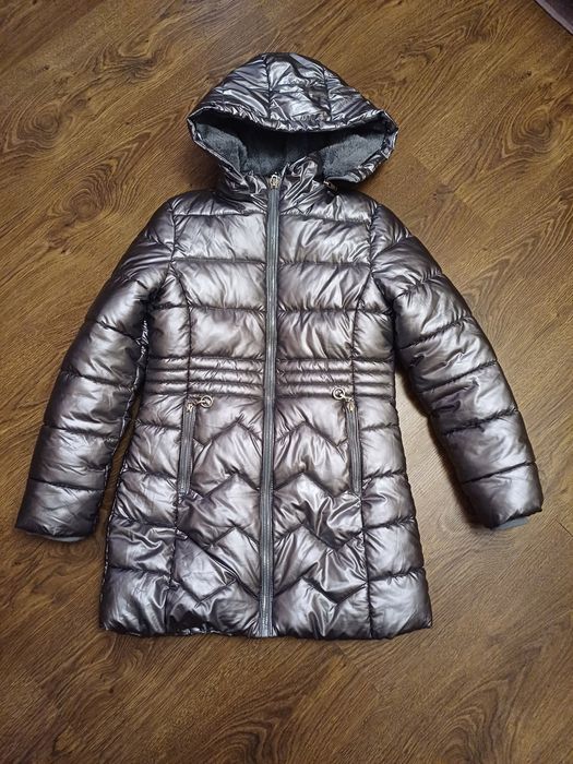 Курточку на зиму дівчинку 8років