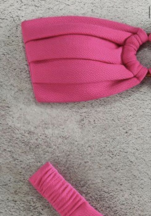 Жіночий рожевий купальник