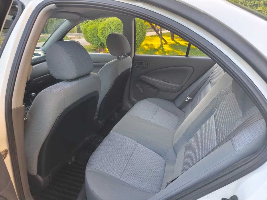 Nissan Almera 2012 VIN KNMCSHLMSDP890885 фото оголошення 9 з 13