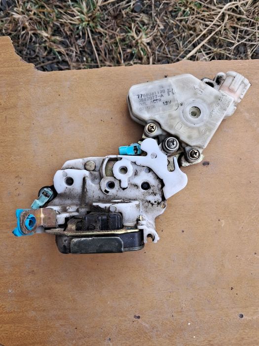 Замок правої дверки Нісан Альмера Классік