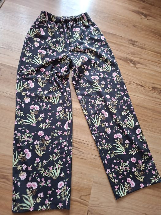 Spodnie poszerzane roz 38