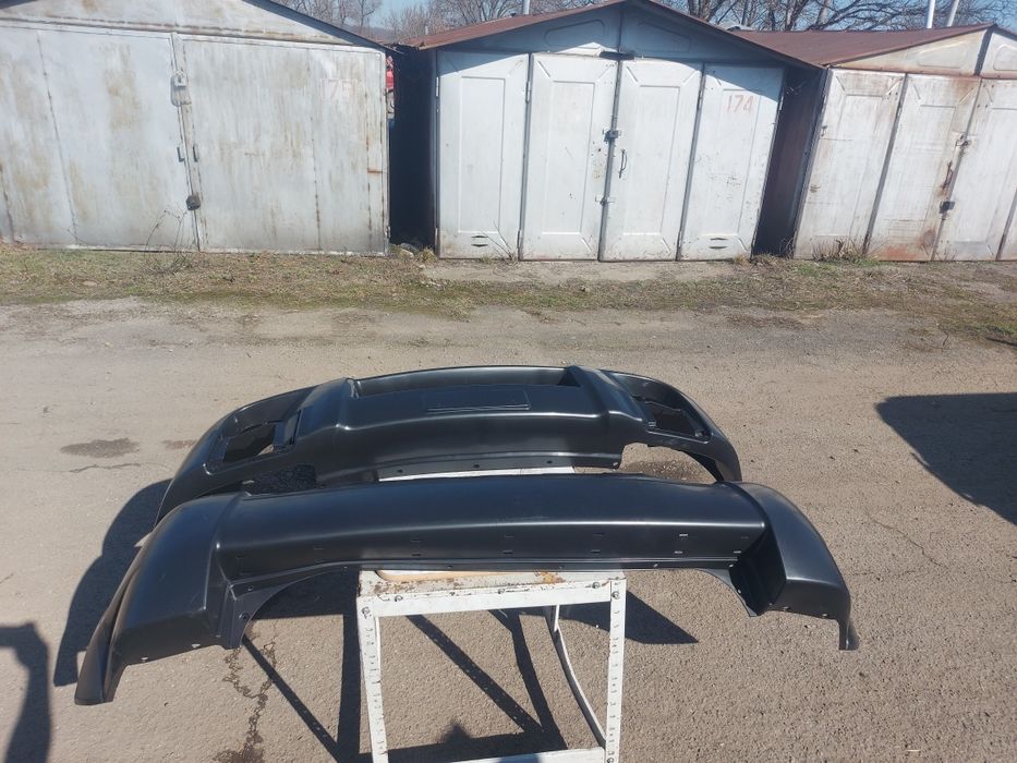 Продам бампера Туксон 2008р нові