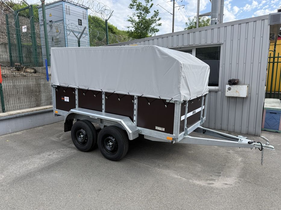 Прицеп URSA оцинкованный двухосный. 3000х1500. Борт 700 мм.