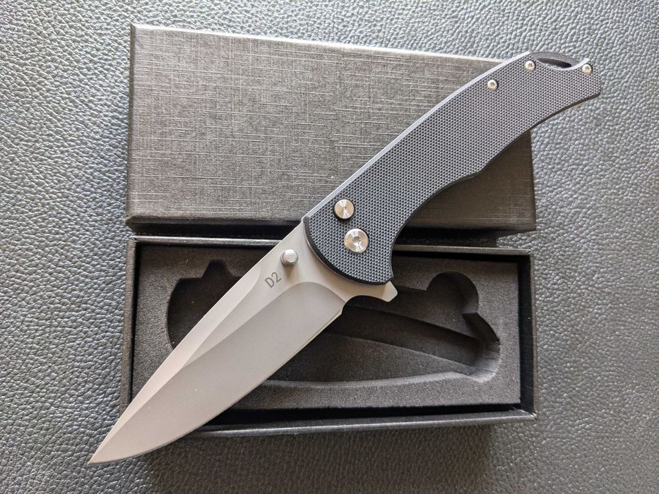 Ніж складний. сталь D2. кнопочний  інерційний ніж