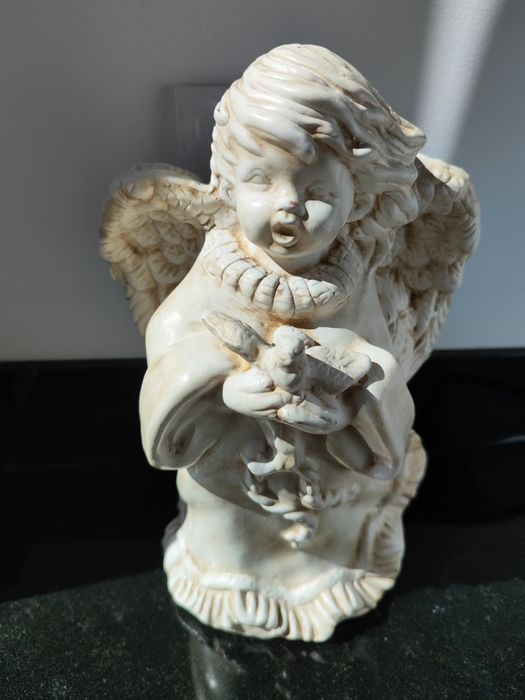 estatueta de anjo