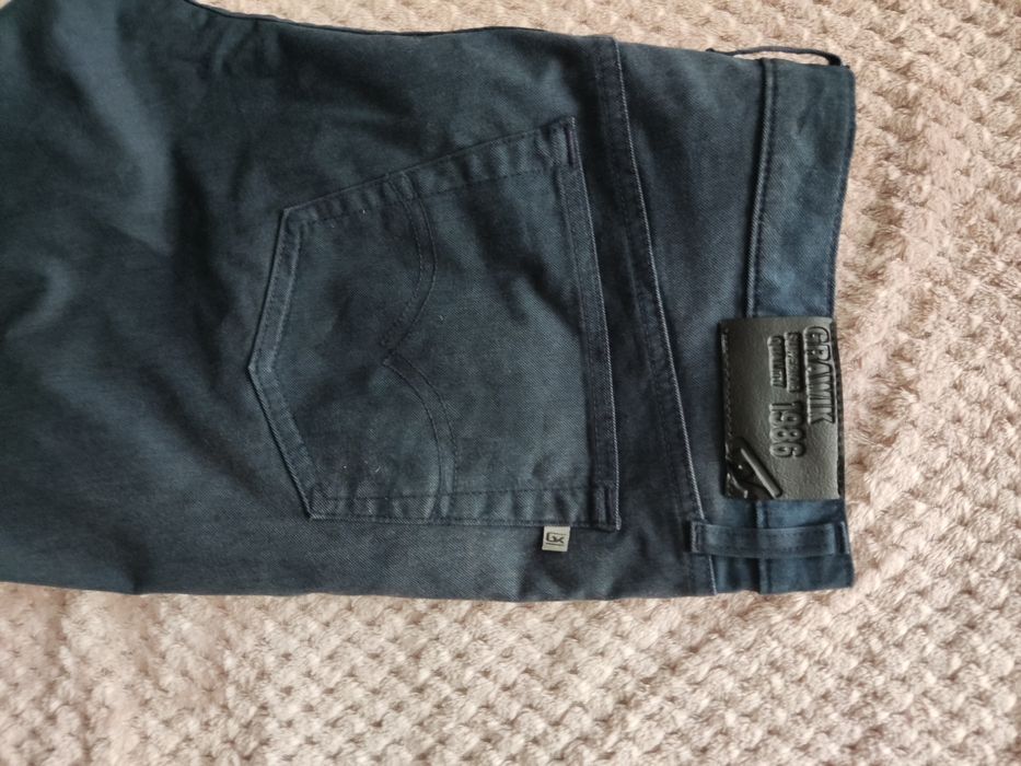 Męskie ciemne spodnie jak nowe Grawik rozmiar 39 L30 na XL