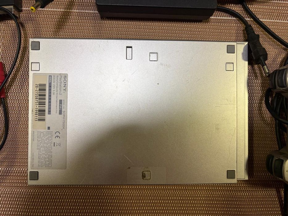 PlayStation 2 Slim Silver + comando