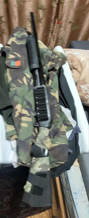 Vendo shotgun airsoft bom estado