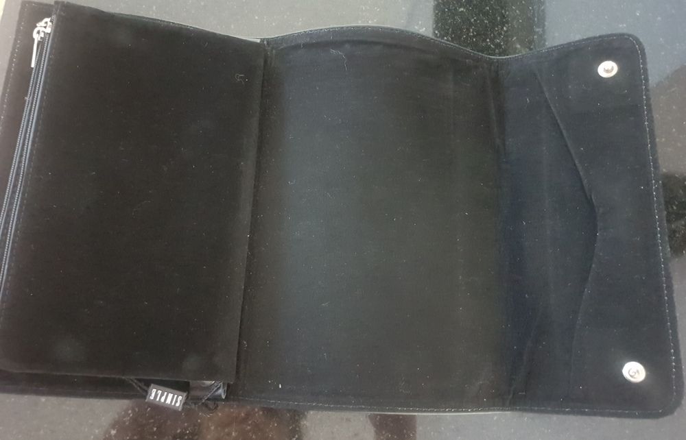 Czarna torebka , skórzana kopertówka simple