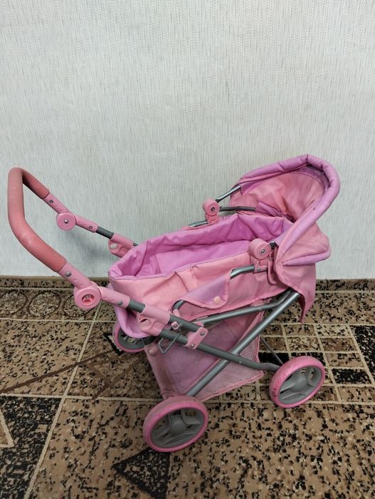 Дитяча іграшкова коляска