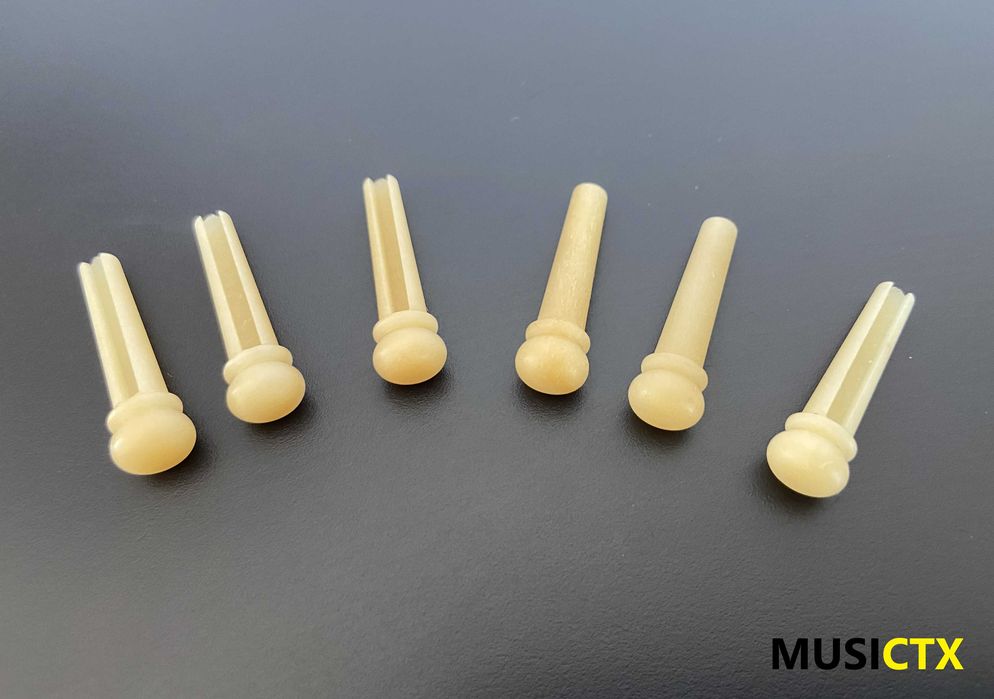 Pins em osso para guitarra folk