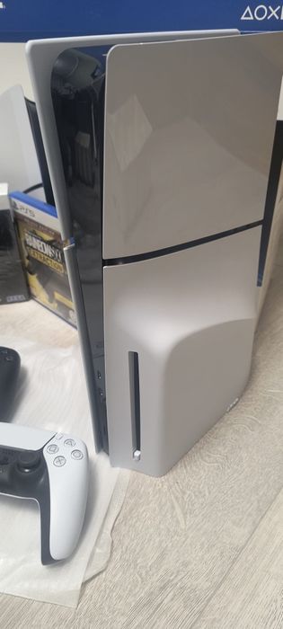 PlayStation 5 slim + 2 Pady DualSense + Gry + Pudełko