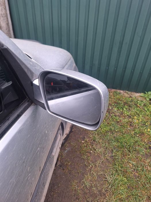 Праве зеркало Шевроле нива