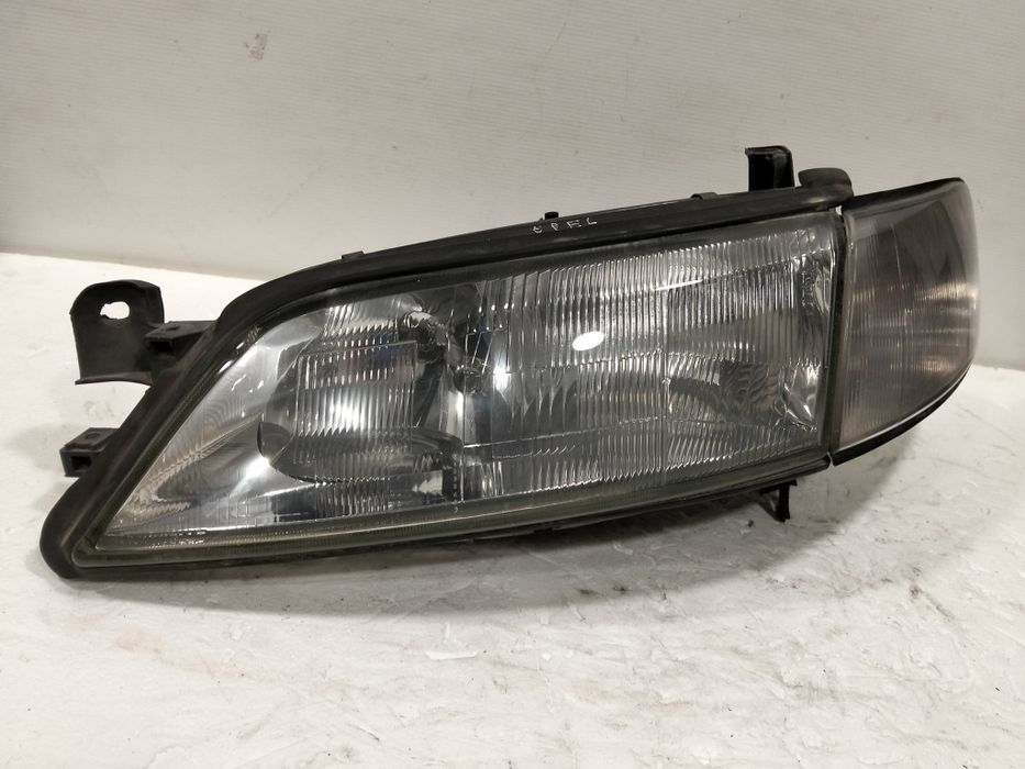 Farol Opel Vectra B ÓTICA esquerdo 1998