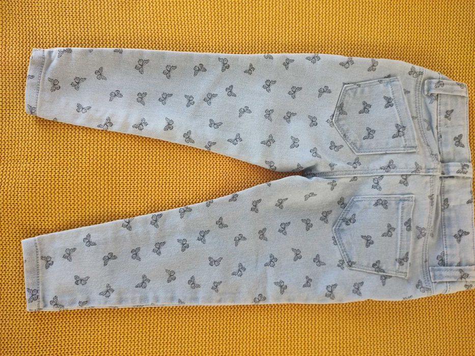 spodnie jeans w motylki