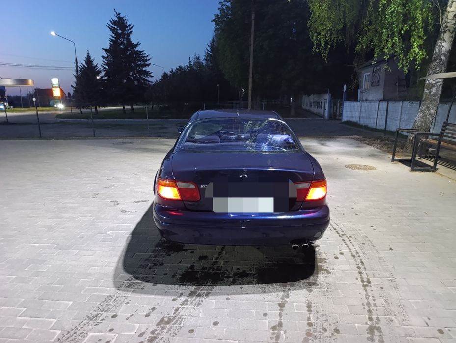Мазда кседос 9.   2.0v6