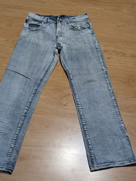 39* Spodnie męskie rozmiar 32 firmy Trang