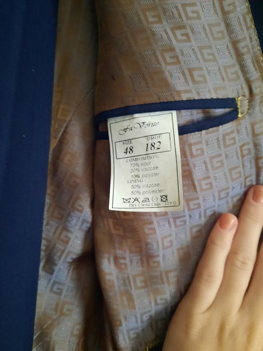 Чоловічий брючний костюм темно синього кольору 48 розміру