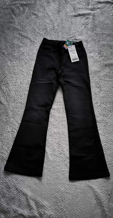 Nowe spodnie jeansowe coccodrillo r. 140 flare leg slim