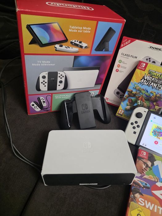 Nintendo switch Oled + 4 gry