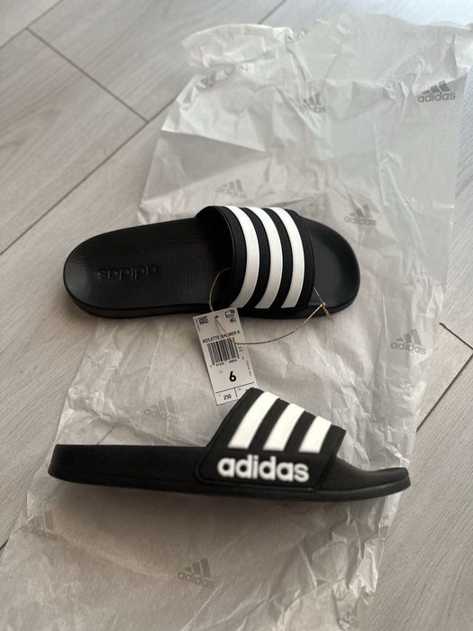 Нові шльопанці унісекс adidas 38,5 розмір 25 см
