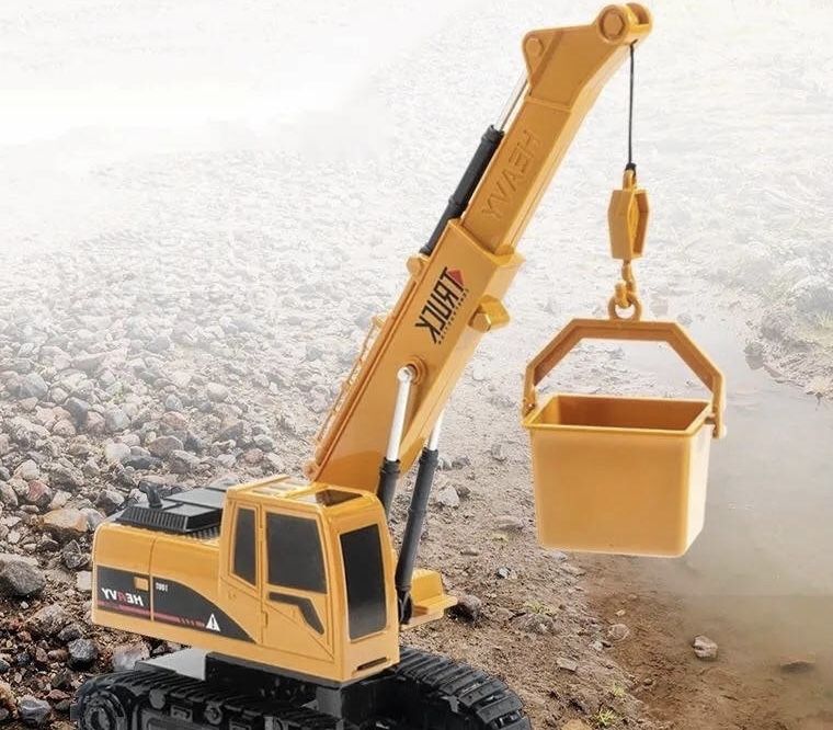 Іграшка підйомний кран на пульті игрушка подйомний кран на пульте