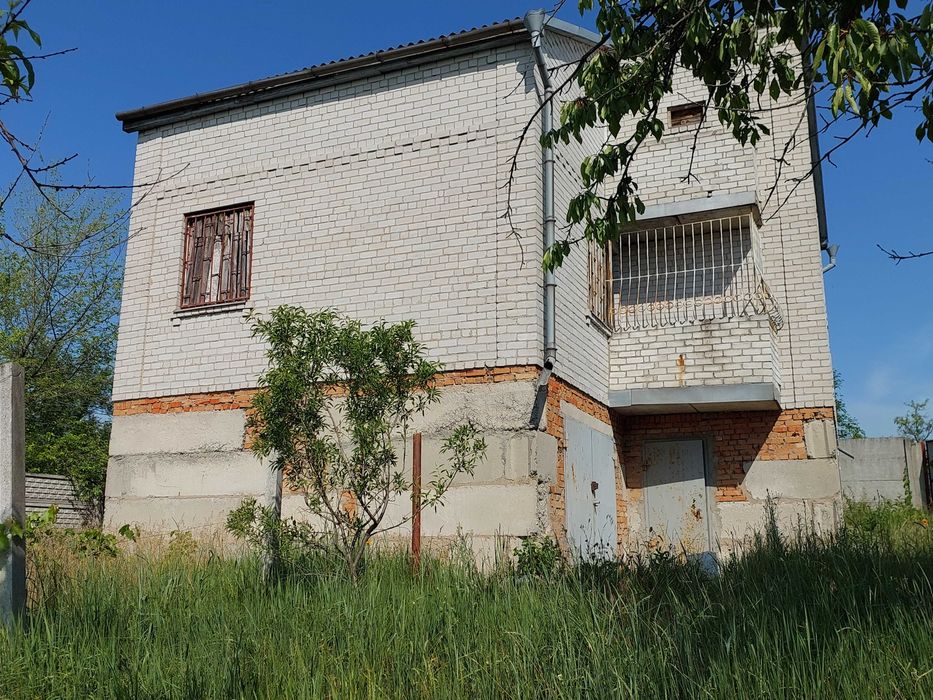 Продам дом с участком в г. Подгородное