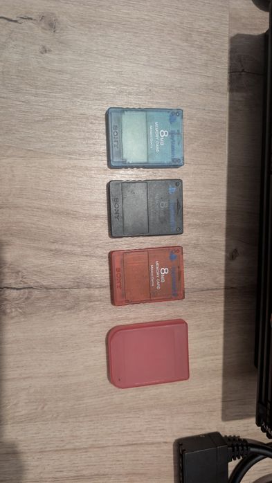 PlayStation 2 (Fat) com 3 comandos, 3 cartões de memória e multitap64551107178242124