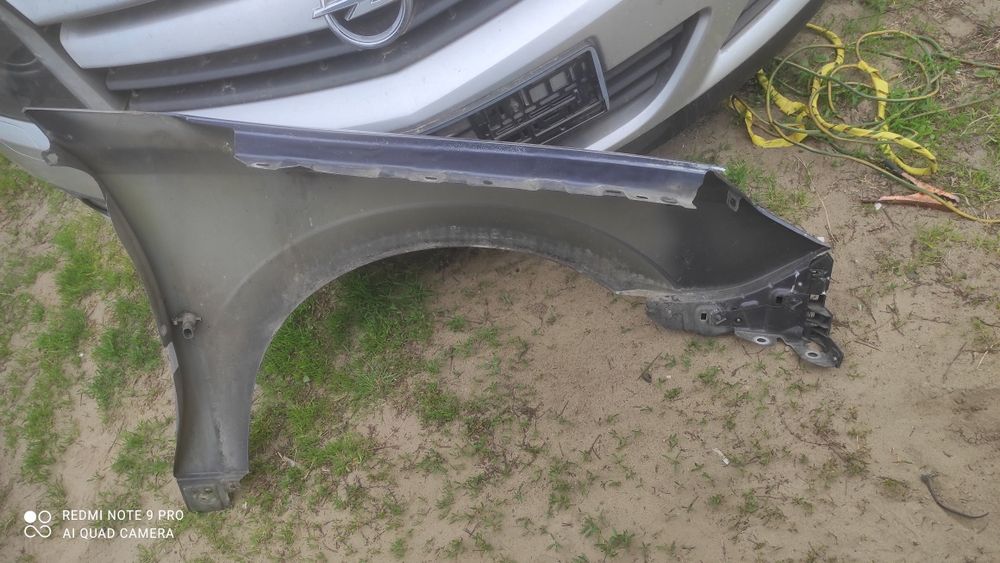 Opel Vectra C polift błotnik lewy