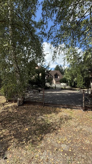 Продажа дома с. Дмитровка 415 м2. 30 соток. Резиденция в соснах.