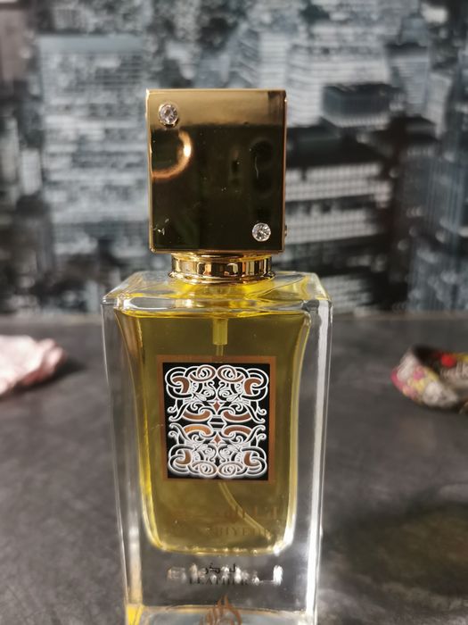 LATTAFA Ana Abyedh LEATHER 60ml EDP ubytek używane