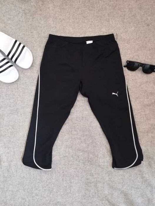 Czarne legginsy spodenki kolarki rybaczki damskie Puma sportowe