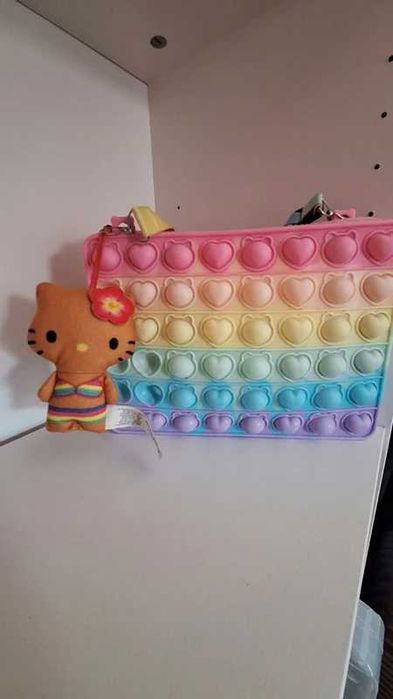 Mala tiracolo, pop it, Hello Kitty, bolso pop it, bolso antiestrés, bolsa sensorial! Porto