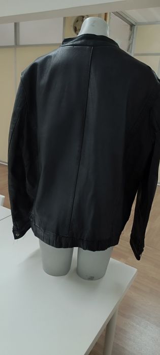 Black jacket, used. Size 50.64752274562818123