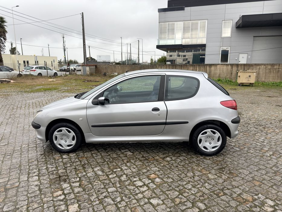 100 mil kms 206 comoletamente nova