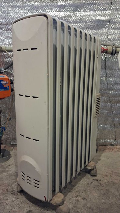 Масляный обогреватель DeLonghi