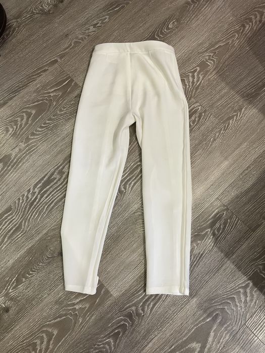 Класичні білі штани жіночі