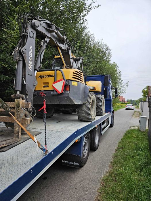 Pomoc drogowa Transport koparek maszyn samochodow